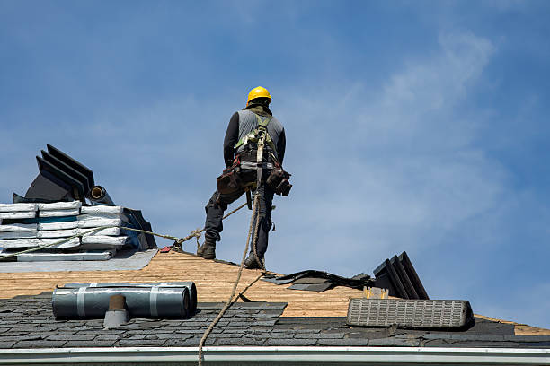 Professional Roofing technician working in Rye, NH